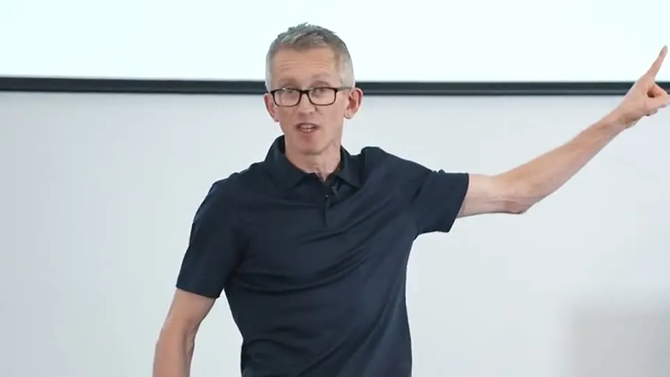 Andrew Pain speaking at his burnout talk, March 2026